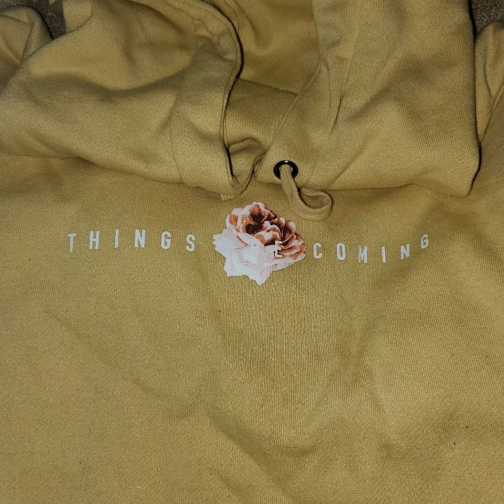 BEAUTY THINGS ARE COMING NO BOUNDARIES SOFT YELLOW FLORAL GRAPHICS HOODIE